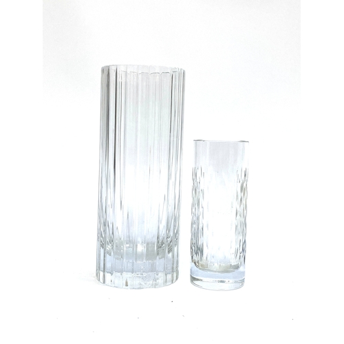 205 - Two Baccarat glass vases, the taller with engraved vertical lines, large chip to base, 30cmH, the sm... 