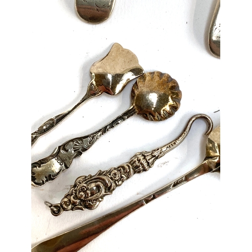 78 - A matched set of eight Georgian silver teaspoons, hallmarked WE; together with four small silver ite... 