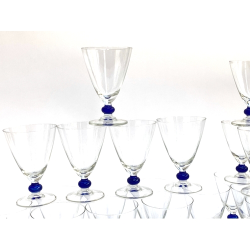 220 - A quantity of wine glasses to include; nineteen small 12cmH, thirteen large 13cmH and six champagne ... 