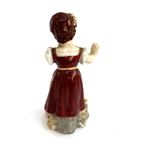 229 - A small continental porcelain figure of a young girl and birds, marked PF to base 13.5cmH