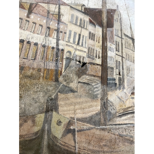 645 - A 20th century oil on canvas, fishing boats on a continental quay, 60x51cm