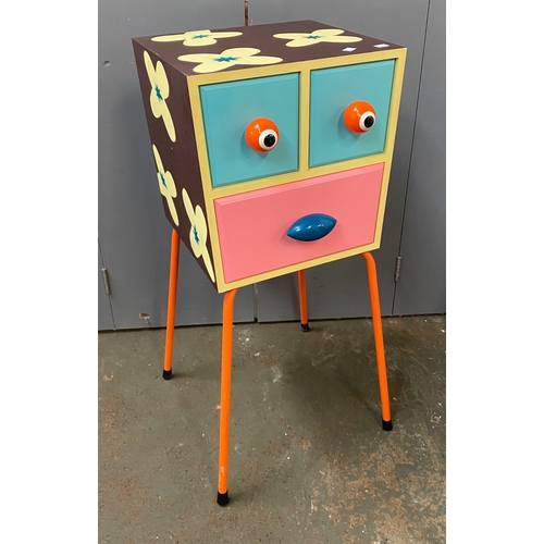 918 - A modern painted cabinet of three drawers, with a face, 40x35x90cmH