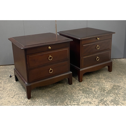 921 - A pair of Stag furniture bedside cabinets, each comprising a slide over two drawers, 52x46x50cm