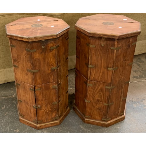 903 - A pair on Eastern hardwood brass bound octagonal pedestal drinks cabinets, 43cmW, 78cmH