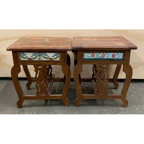 912 - A pair of hardwood occasional tables, each with single drawer and tiled aprons, 45x45x50cm