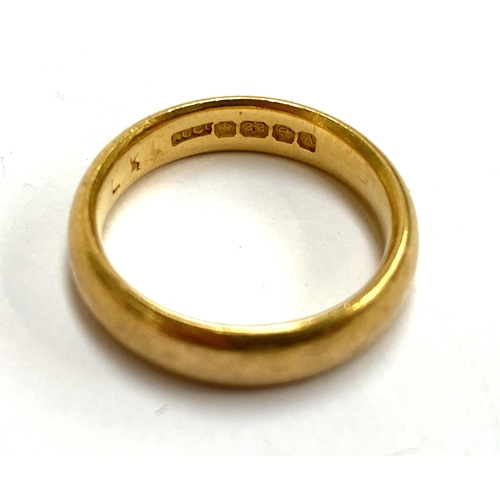 2 - A 22ct gold wedding band, size K 1/2, hallmarked for ACC, Birmingham, 1925, 6.4g