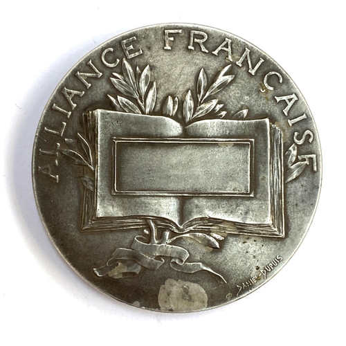 105 - An early 20th century French silver Concours Special 'Alliance Francaise' medallion by Daniel Dupuis... 