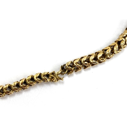 29 - A yellow metal bracelet (af), the snake link chain testing as 15ct or higher, 9.6g gross weight