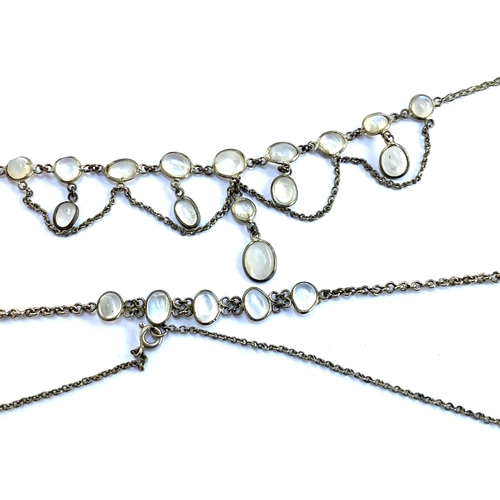 30 - A white metal and moonstone festoon necklace (af), 45cmL unclasped length; together with a white met... 