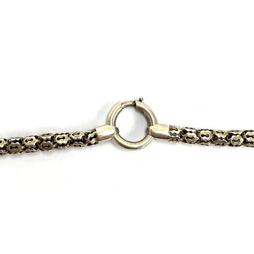 31 - A Victorian silver fancy link snake locket chain (one link af), fastening with a bolt clasp, 43cmL u... 