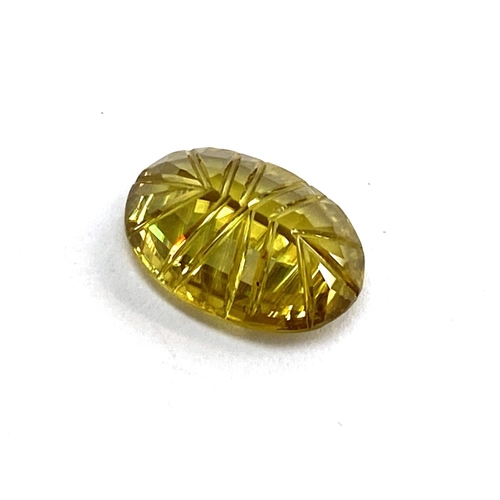 52 - A loose sphene, oval mixed cut 1.75cts, 9.37x6.47x3.62