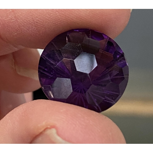 54 - A large fancy cut loose amethyst, 21.64cts, 18.2x13.06mm; together with nine loose amethysts totalli... 