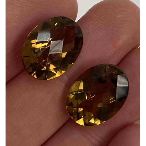 57 - Two loose citrine stones, totalling approx. 16.9cts