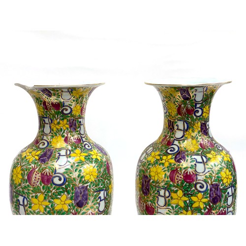 211 - A large Chinese decorative vase (AF) of baluster hand painted with pomegranates, roses and yellow fl... 