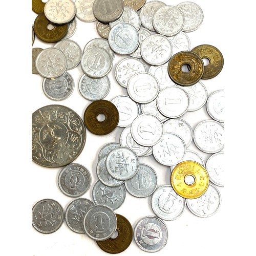 108 - A quantity of foreign coins to include euros (approx. €11+), Japanese yen, Zimbabwean dollars c.1990... 