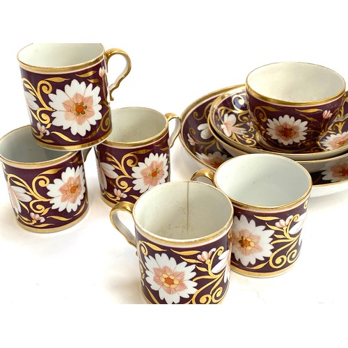 197 - A Worcester (Barr) part tea service, brown ground painted with flowers, comprising saucers, teacups ... 