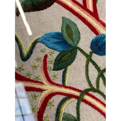 706 - A large 20th century wool work depicting a squirrel below foliage 64x45cm