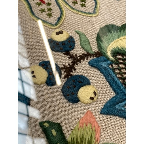 706 - A large 20th century wool work depicting a squirrel below foliage 64x45cm