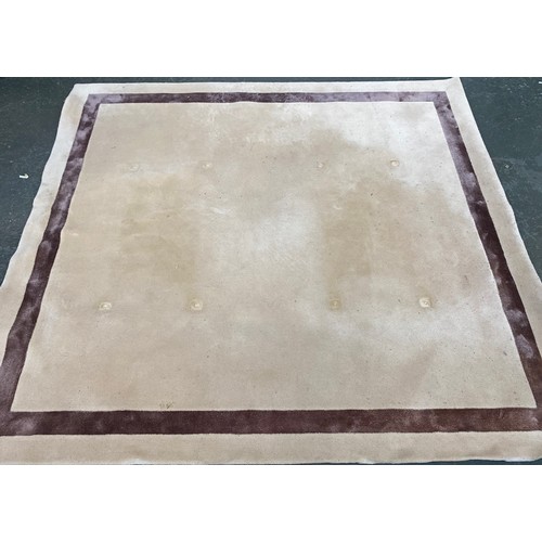 1069 - Two large modern cream rugs with single borders, 230x250cm and 325x285cm