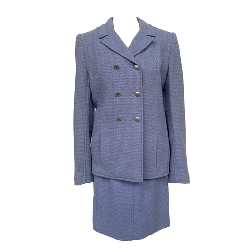 247 - A powder blue Chanel boucle wool suit set, double breasted jacket with weighted chain lined hem, sil... 