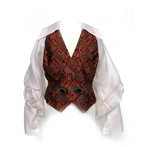 276 - A Christian Dior Boutique silk waistcoat and attached blouse, with crimson, green, and gold toned me...