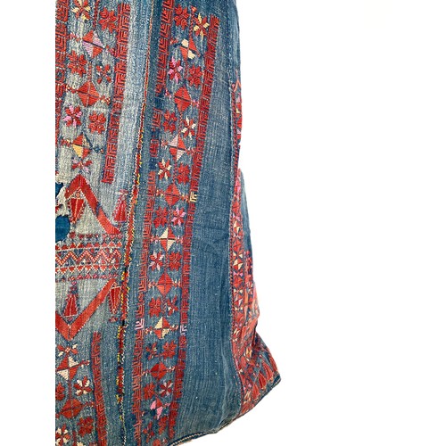 771 - A late 19th/early 20th century Palestinian ladies Thobe dress, indigo dyed cotton with red geometric... 