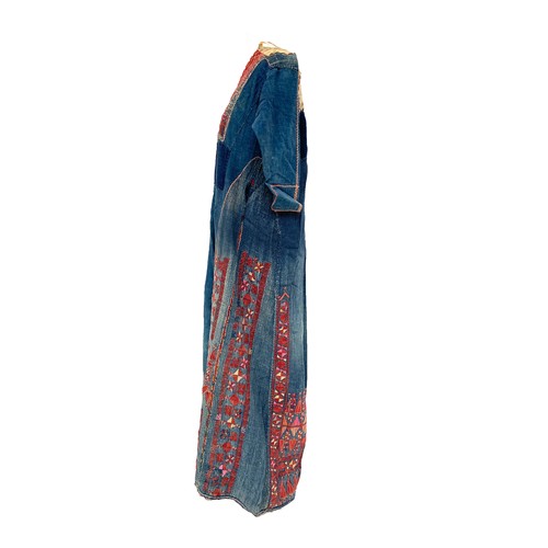 771 - A late 19th/early 20th century Palestinian ladies Thobe dress, indigo dyed cotton with red geometric... 