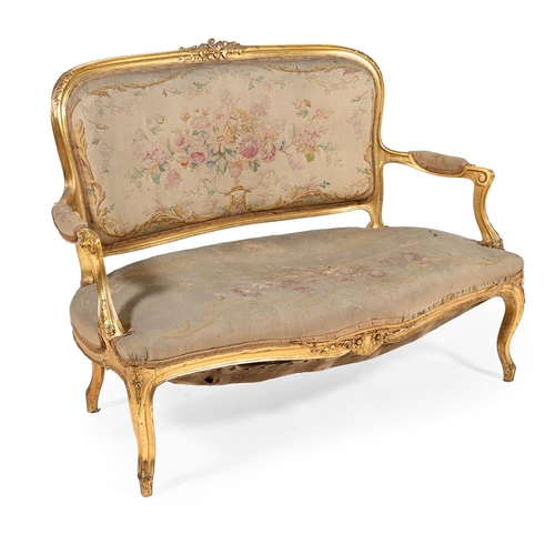 A French giltwood sofa in Louis XV style, 19th century, 136cm wide, 60cm deep, 100cm high
