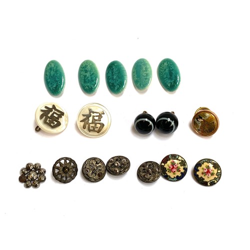 105 - A quantity of buttons to include Ruskin style ceramic buttons; cut steel; Japanese satsuma button wi... 