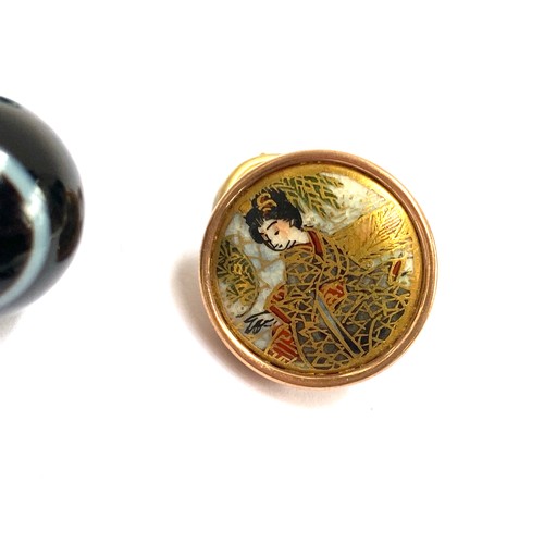 105 - A quantity of buttons to include Ruskin style ceramic buttons; cut steel; Japanese satsuma button wi... 