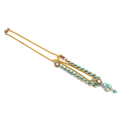 41 - A Victorian gold necklace, the snake chain suspending swags of channel set turquoise leaves interspe... 