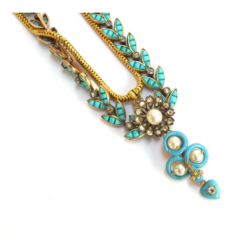 41 - A Victorian gold necklace, the snake chain suspending swags of channel set turquoise leaves interspe... 