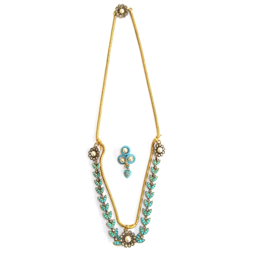 41 - A Victorian gold necklace, the snake chain suspending swags of channel set turquoise leaves interspe... 