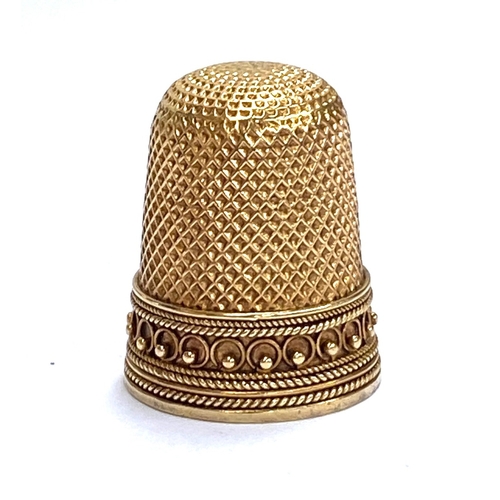 65 - A 19th century gold thimble, tests as 14ct or higher, 5.3g