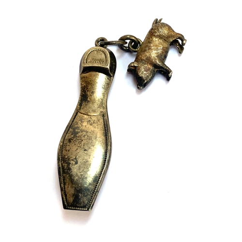 67 - A late 19th/early 20th century 935 sterling silver whistle in the form of a shoe, 4.4cmL; together w... 