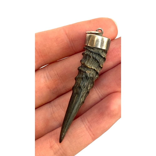 78 - A silver mounted Dik Dik horn pendant