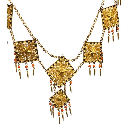 82 - An early 20th century Czech gilt metal filigree necklace, the square panels with applied star detail... 