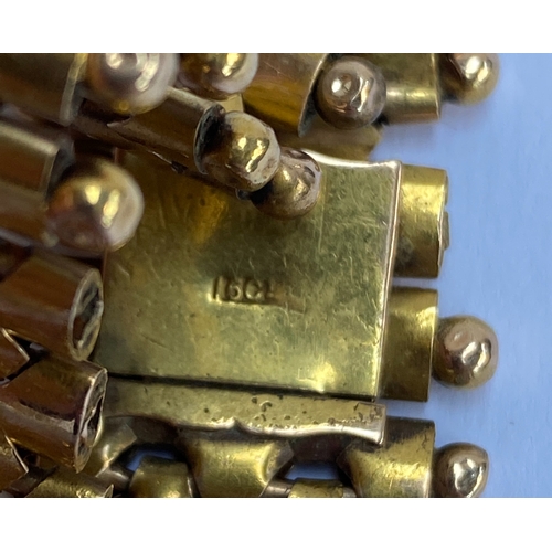 73 - A 15ct gold bracelet (broken), the clasp stamped 15ct, 33.7g