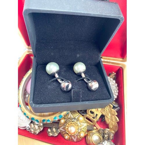 74 - A quantity of costume jewellery to include Ruskin style pewter mounted ceramic plaque; cut steel sty... 