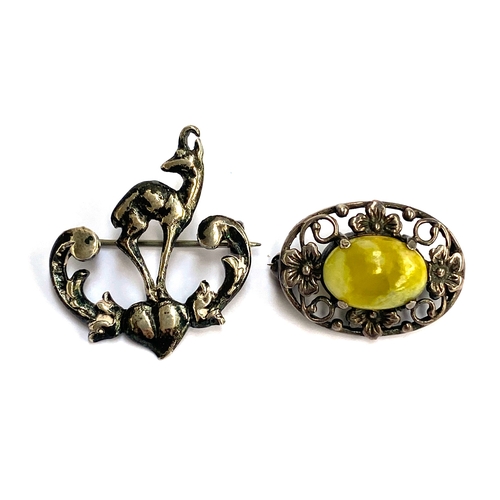 101 - An early 20th century 800 silver antelope brooch; and Bernard Instone style silver and Connemara mar... 