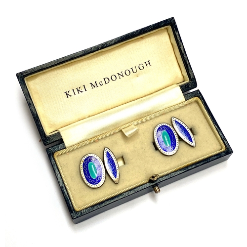 68 - A pair of silver and champleve enamel cufflinks, blue and white design, Chinese hallmarks, in a Kiki... 
