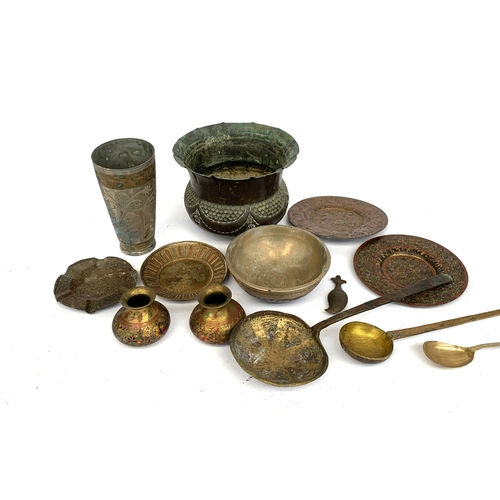 655 - A mixed lot of eastern metal items to include bowls, vases, plates, etc, tallest 18cmH