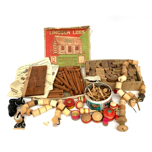 674 - A collection of wooden toys and accompaniments to include: a boxed set of 'Lincoln Logs', together w... 