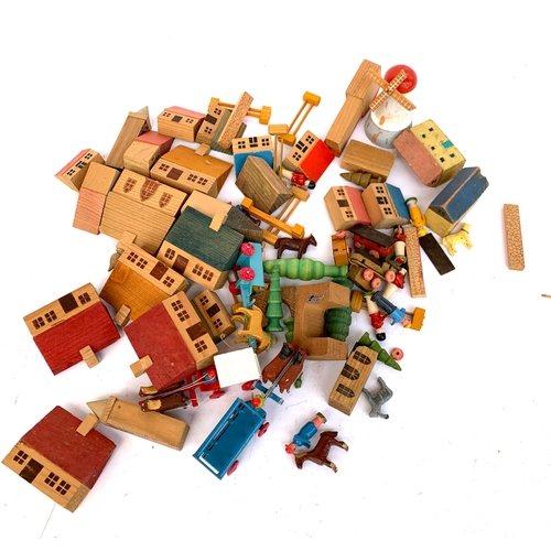 674 - A collection of wooden toys and accompaniments to include: a boxed set of 'Lincoln Logs', together w... 
