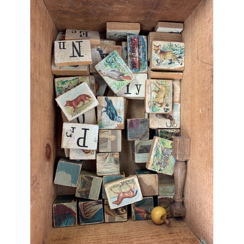 674 - A collection of wooden toys and accompaniments to include: a boxed set of 'Lincoln Logs', together w... 