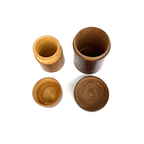 690 - Two 19th century turned cylindrical treen boxes, 9cmH & 7.5cmH