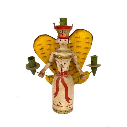 692 - Folk art interest: A polychrome and metal folk style Angel twin fitting candle stick
