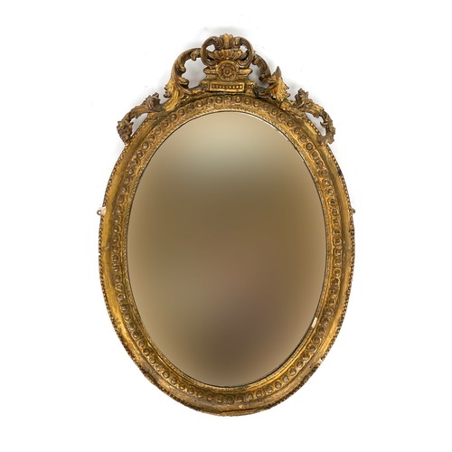 A 19th century oval gilt gesso mirror (af), 55cm wide, 82cm high