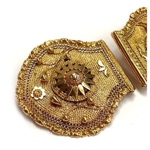 1 - A buckle converted into two brooches, testing as 14ct with later 9ct brooch fittings, each section a... 