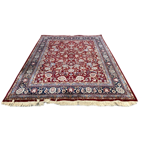 578 - A large Persian Kashan wool carpet, 307x246cm
